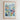 The image is a framed poster depicting a colorful and vibrant flower market in Zanzibar, featuring a variety of flowers and plants.
