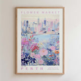 The image is a framed poster depicting a cityscape with a flower market in the foreground.