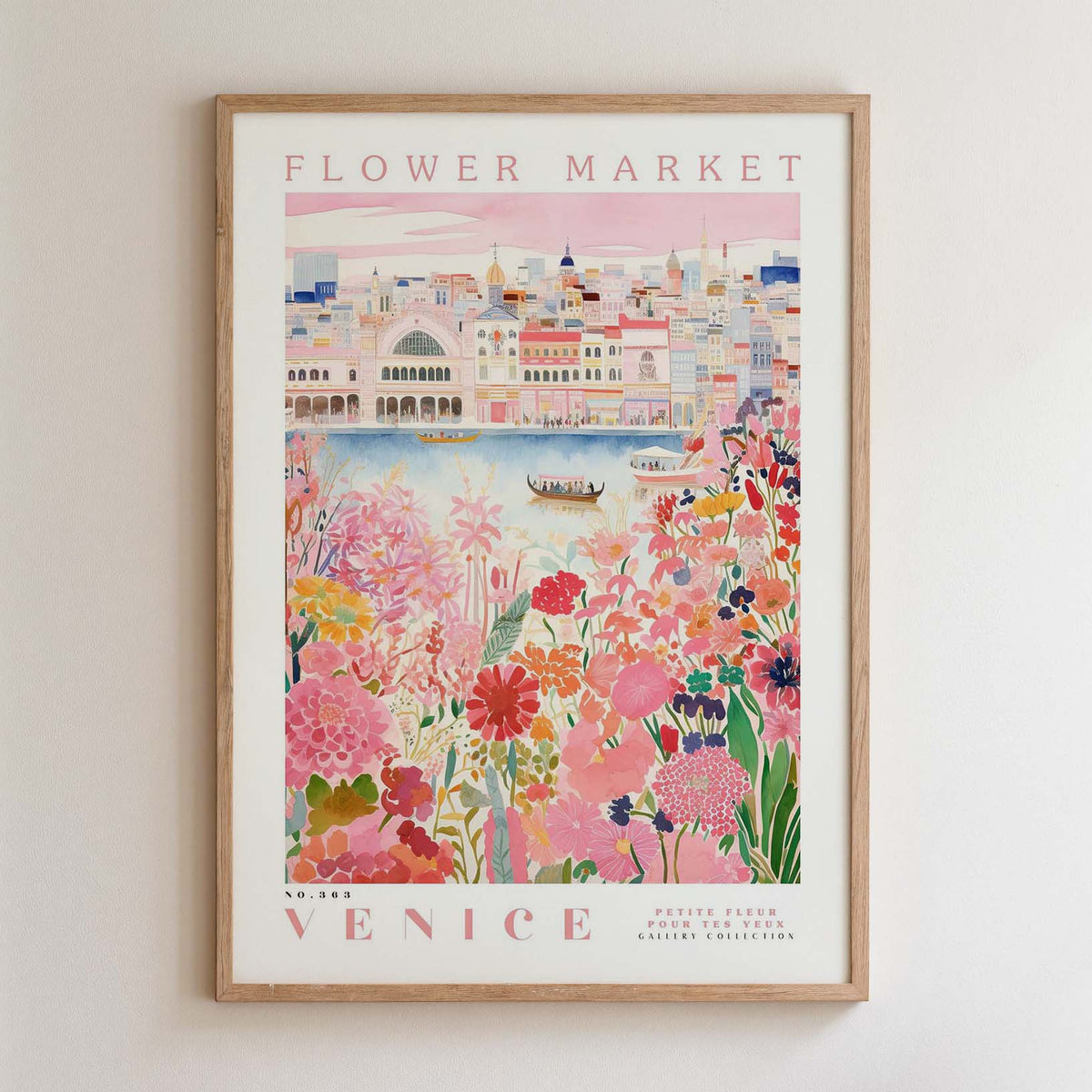 The image is a framed poster depicting a vibrant and colorful scene from Venice, Italy. The poster showcases the city's iconic architecture, including the Ponte Vecchio, surrounded by a lush garden filled with flowers and greenery. The poster is framed with a wooden border and features the text "FLOWER MARKET" and "VENICE" prominently displayed.