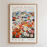 The image is a framed poster depicting a colorful and vibrant flower market scene.