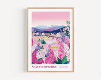 The image is a framed poster depicting a scenic landscape in New Hampshire, featuring a mountain range, a river, and a variety of colorful flowers and foliage.