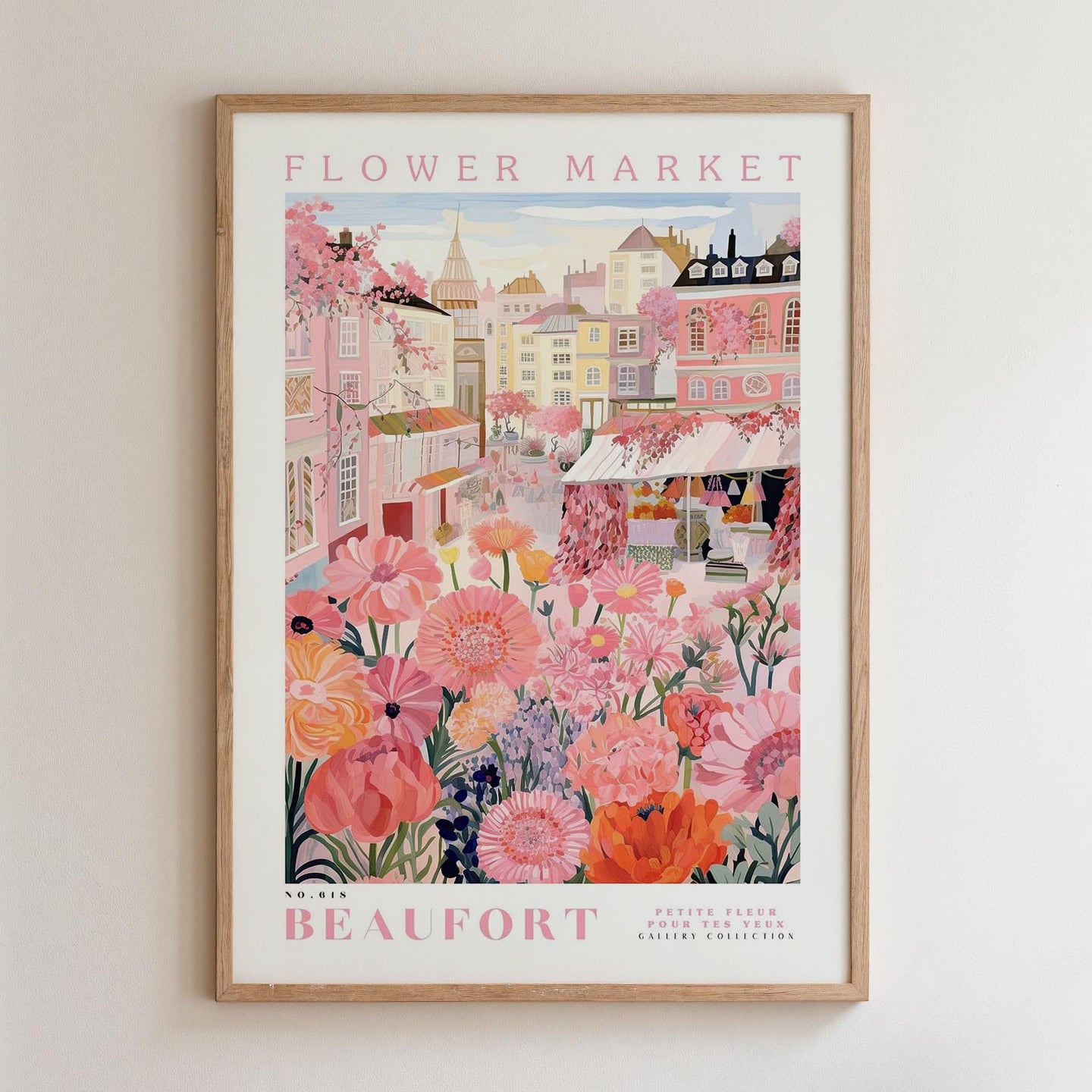 The image is a framed poster depicting a vibrant and colorful scene from the Flower Market in Beaufort, featuring a variety of flowers and buildings in shades of pink, orange, and yellow.