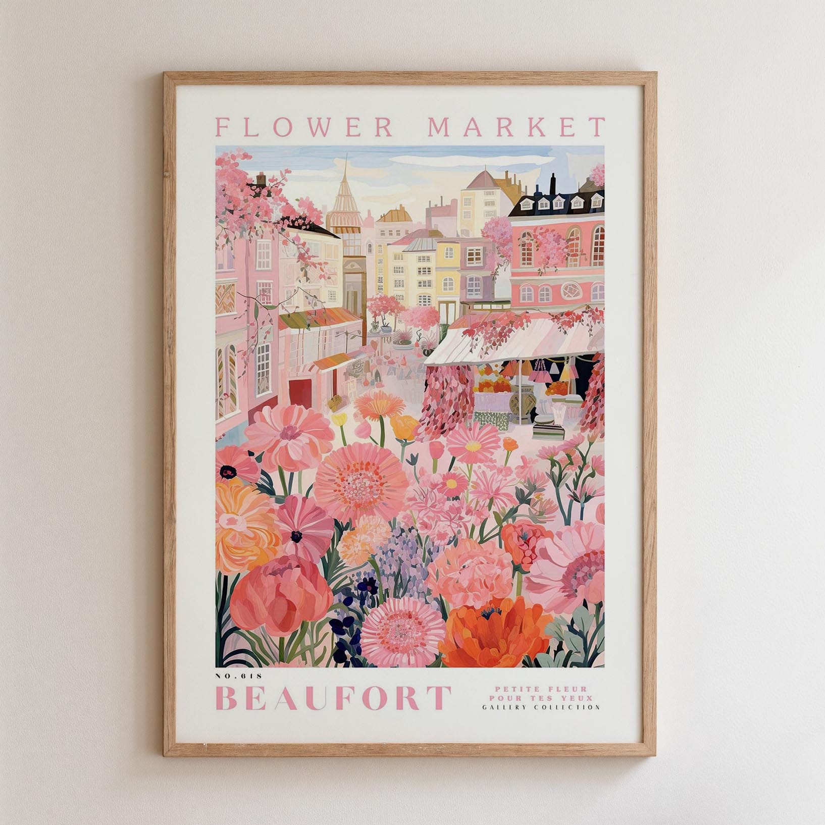 The image is a framed poster depicting a vibrant and colorful scene from the Flower Market in Beaufort, featuring a variety of flowers and buildings in shades of pink, orange, and yellow.