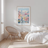 a bedroom with a bed, a woven chair, and a framed poster of a flower market in San Antonio.