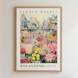 The image is a framed poster depicting a vibrant flower market in San Antonio, Texas.
