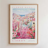 The image is a framed poster depicting a colorful and vibrant scene of a flower market in Lisbon, Portugal.