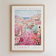 The image is a framed poster depicting a colorful and vibrant scene of a flower market in Lisbon, Portugal.