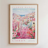 The image is a framed poster depicting a colorful and vibrant scene of a flower market in Lisbon, Portugal.