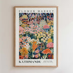 The image is a framed poster depicting a vibrant and colorful flower market in Kathmandu, Nepal.