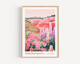 A framed illustration depicting a vibrant landscape with a variety of colorful flowers, including pink, purple, and white blooms, set against a backdrop of mountains and a clear sky.