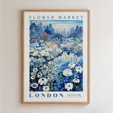 The image is a framed poster depicting a cityscape with a field of flowers in the foreground.