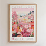 The image is a framed poster depicting a vibrant and colorful scene of a flower market in Malibu, California.