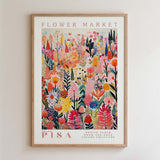 The image is a framed poster featuring a vibrant and colorful illustration of various flowers and plants.