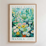 The image is a framed poster depicting a vibrant and colorful flower market in Manila, Philippines.