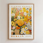 The image is a framed poster depicting a vibrant and colorful flower market in Berlin.