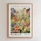 The image is a framed poster depicting a vibrant and colorful flower market in Dublin, Ireland.