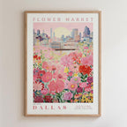 The image is a framed poster depicting a cityscape with a field of colorful flowers in the foreground.