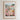 The image is a framed poster depicting a flower market in a coastal town, with colorful flowers and buildings in the background.