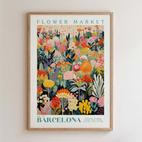 The image is a framed poster depicting a vibrant and colorful floral market in Barcelona, Spain.