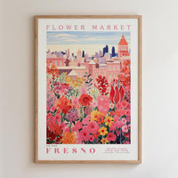 The image is a framed poster depicting a vibrant and colorful flower market in the city of Fresno, California.
