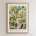 The image is a framed poster or print featuring a vibrant, colorful floral pattern with various types of flowers and foliage.