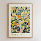 The image is a framed poster or print featuring a vibrant, colorful floral pattern with various types of flowers and foliage.