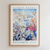 The image is a framed poster depicting a colorful and vibrant flower market in Santorini, Greece.