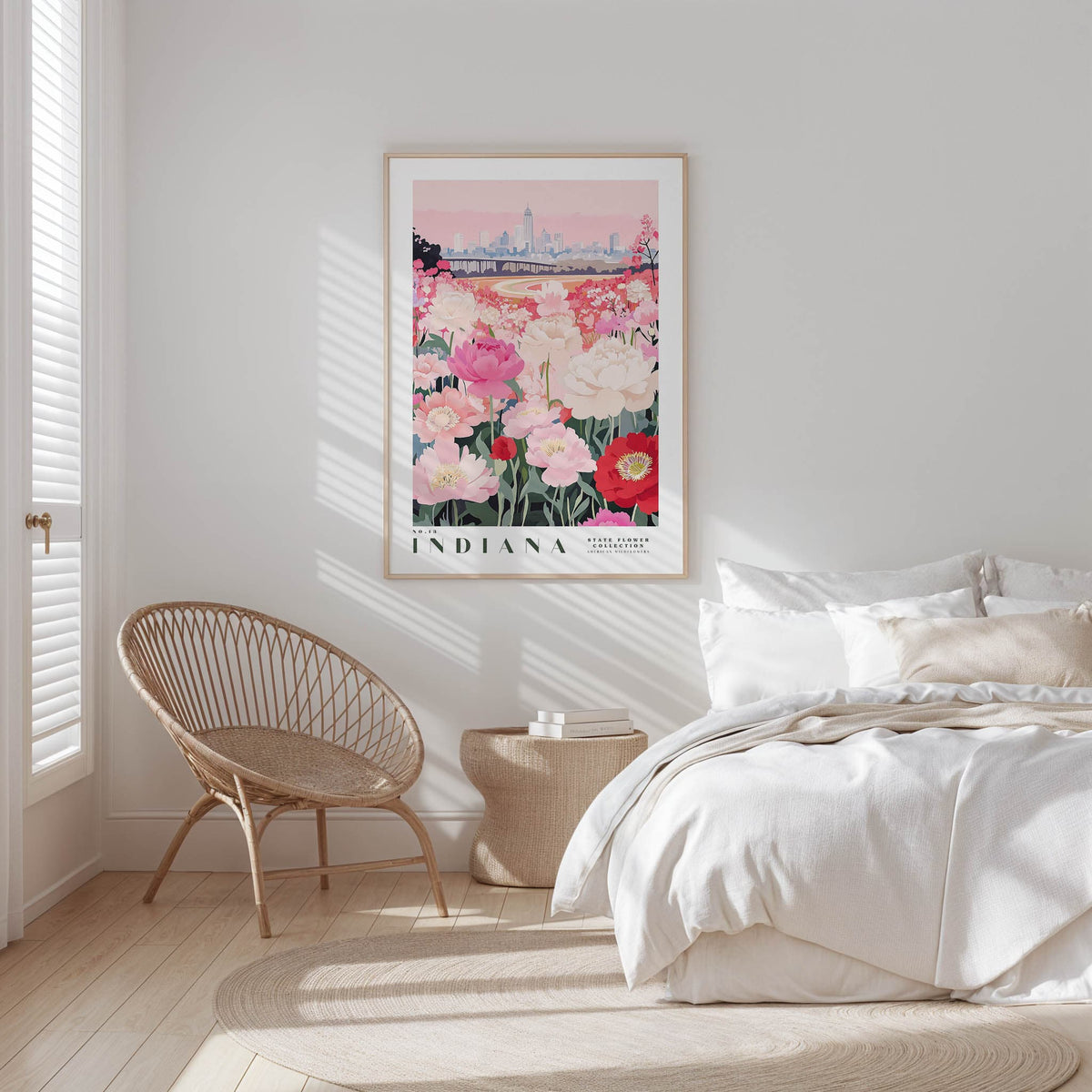 a bedroom with a large framed poster of a city skyline hanging on the wall above a bed with white bedding.