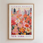 The image is a framed poster depicting a vibrant and colorful flower market in New York.
