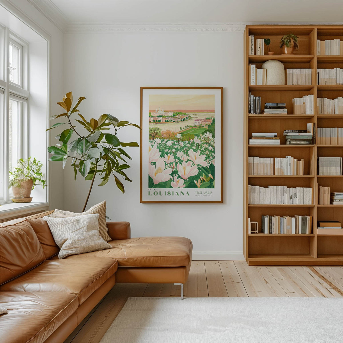 a cozy living room with a large window, a comfortable leather sofa, a wooden bookshelf filled with books, and a framed poster of a field of flowers hanging on the wall.