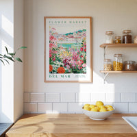 a framed poster of a flower market, a wooden counter with a bowl of lemons, and shelves with jars and containers.