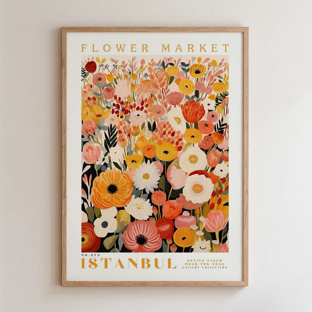 The image is a framed poster depicting a vibrant and colorful floral arrangement, with various types of flowers and foliage. The poster is titled "Flower Market Istanbul" and is framed with a wooden border.