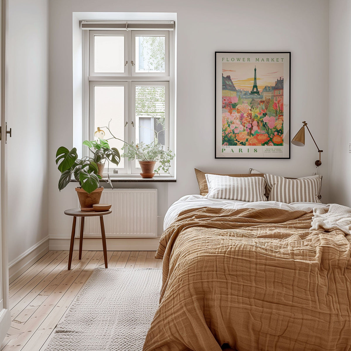 a cozy bedroom with a large bed, a nightstand with a plant, and a framed poster of Paris on the wall.