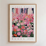 The image is a framed poster depicting a vibrant and colorful flower market in Seoul, South Korea.