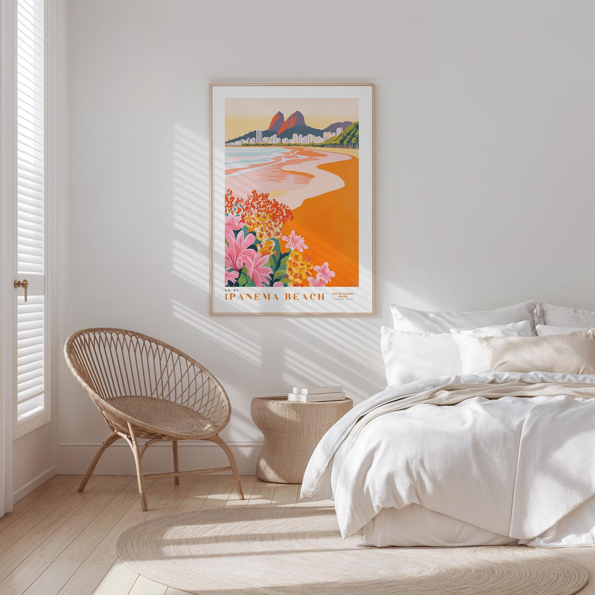a serene bedroom scene with a large framed poster of the Panama Beach on the wall, a woven chair, and a neatly made bed with white linens.