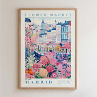 The image is a framed poster depicting a colorful and vibrant scene from the Flower Market in Madrid, Spain.