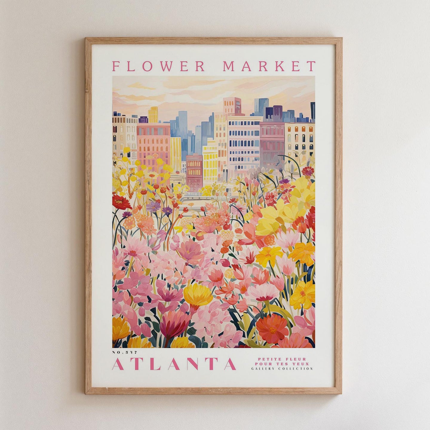 The image is a framed poster depicting a cityscape with a field of colorful flowers in the foreground.