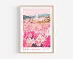 A framed poster depicting a scenic view of the state flower garden in West Virginia, with a large white building and a field of pink and white flowers in the foreground.