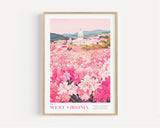 A framed poster depicting a scenic view of the state flower garden in West Virginia, with a large white building and a field of pink and white flowers in the foreground.