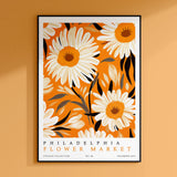a picture of a flower market poster hanging on a wall