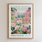The image is a framed poster depicting a vibrant and colorful flower market in the city of Greenwich, London.